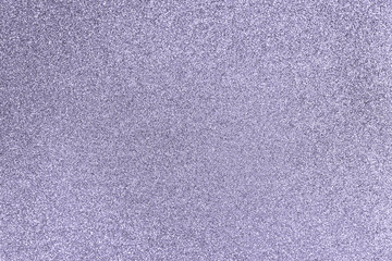 Silver violet glitter twinkle abstract festive winter holiday background with sparkles. Modern luxury mock up with sequins. Texture of colored porous rubber with spangles