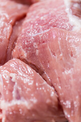 Closeup top view piece fresh raw meat of pork