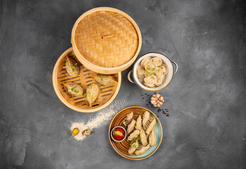 Steamed Bun and Shrimp Shumai, a steamed dish in a bamboo steamer box to enjoy the sweet tenderness of dried sakura shrimp., Name dim sum.