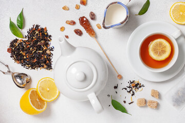 Tea composition on light grey background. Flat lay. Top view. Banner