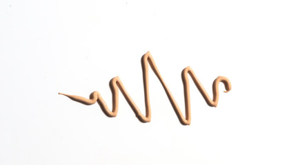 Creamy foundation white background. Isolated. Beauty and fashion conception. Liquid cream cosmetic,