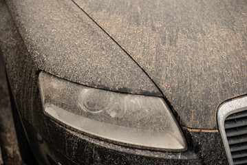 a car in germany polluted with sand from the sahara - obrazy, fototapety, plakaty
