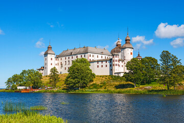 Fototapeta na wymiar Beautiful Lacko castle on a hill by lake Vanern in Sweden