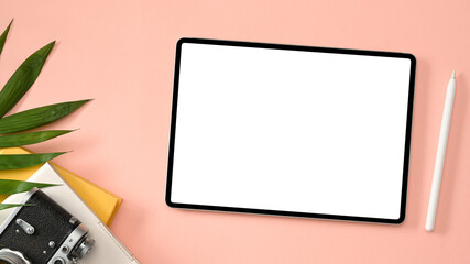 Top view, Travel blogger workspace with digital tablet mockup