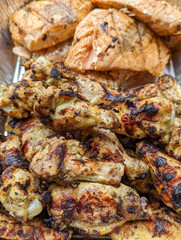 Chicken meat fried on a barbecue grill