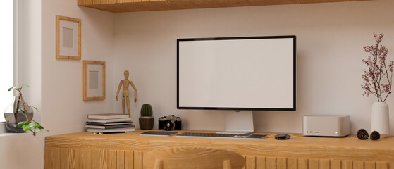 Scandinavian and cozy home workspace with pc computer on wood table