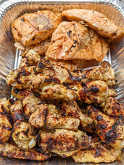 Chicken meat fried on a barbecue grill