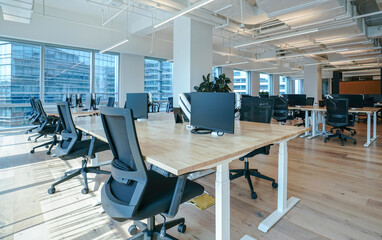 Interior of modern empty office building.Open ceiling design.