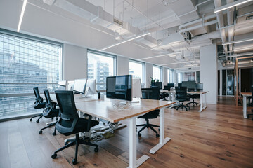 Interior of modern empty office building.Open ceiling design.
