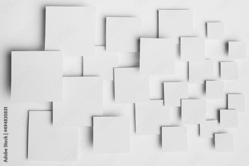 Poster white abstract background - geometric pattern of different size squares in light with soft shadows, 