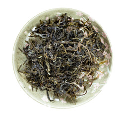 shredded dried seaweed in bowl isolated on white background
