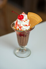 Strawberry and Chocolate Ice Cream with Red Cherry Whipped Cream