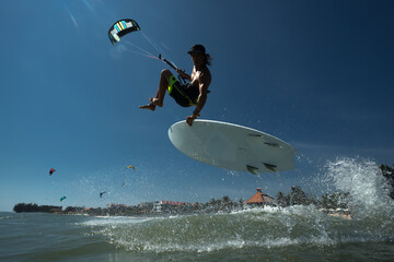 Kitesurf freestyle at sunset.