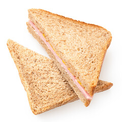 Two ham and mustard wholewheat triangle sandwiches from above.