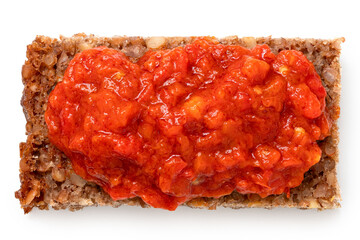 Ajvar on a slice of health bread from above.