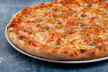 pizza on the wooden background
