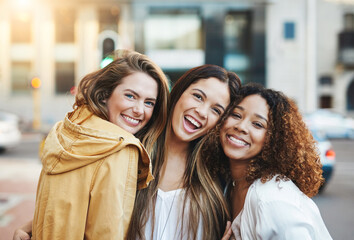 Out in the city where fun never stops. Cropped shot of three friends having fun in the city.