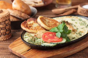 Traditional cuisine of Tver - egg pie with fish - tverskoi choryg with kokorka