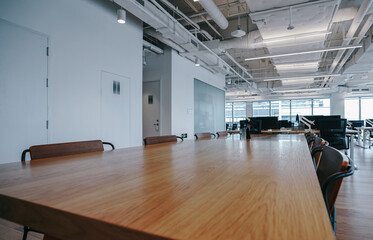 Interior of modern empty office building.Open ceiling design.