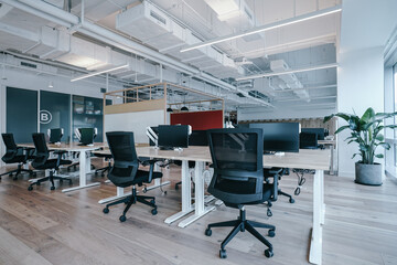 Interior of modern empty office building.Open ceiling design.