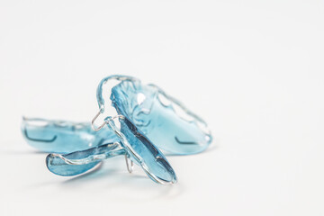 Retainer healthcare medical teeth mouth. Retainer blue on a white background.