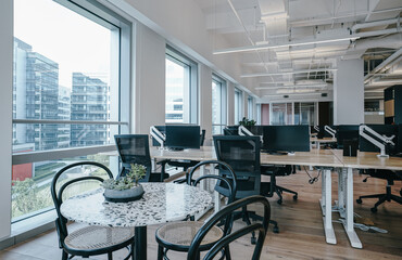 Interior of modern empty office building.Open ceiling design.