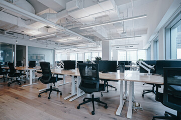Interior of modern empty office building.Open ceiling design.