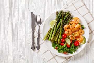 toasty asparagus with fried prawns, lime and salad