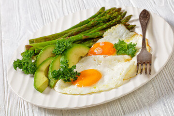 roast asparagus, ripe avocado and fried eggs