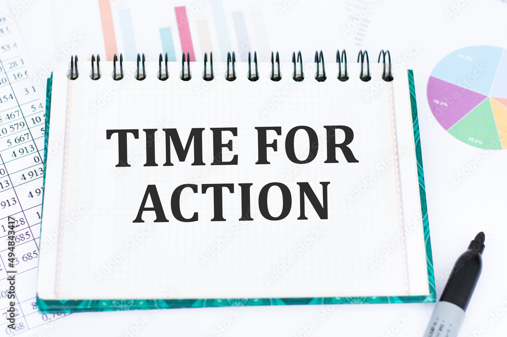 Poster a white card with time for action text on a white notepad on the table, business concept