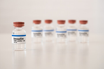 Insulin vials against a white background: properly cooling and storing insulin. 