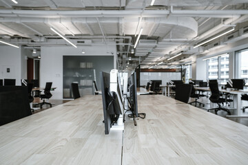 Interior of modern empty office building.Open ceiling design.