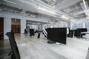 Interior of modern empty office building.Open ceiling design.
