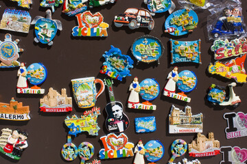  Colorful souvenir magnets in a gift shop in Monreale, Sicily, Italy
