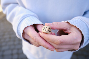 Game dice in hand. Time to start the game. Roll the dice