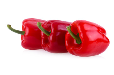 Fresh red bell peppers isolated on white background