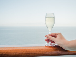 Beautiful glass with a drink. Side view, close-up. Vacation and travel concept. Moments of celebration