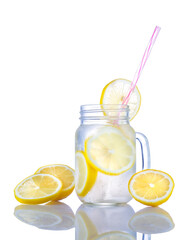 High resolution photo: lemon drink with fruit slices