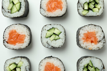 Concept of tasty food with maki on white background