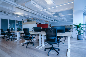 Interior of modern empty office building.Open ceiling design.