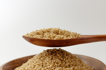 brown rice on a white background
