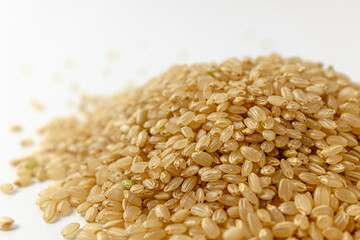 brown rice on a white background