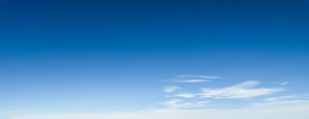 Obraz premium Panorama of blue sky with white foggy clouds