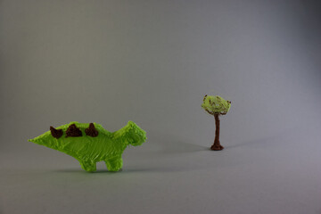 3D illustration of a dinosaur and tree isolated on gray background
