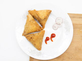 three deep fry Samosa isolated on white background,