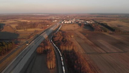 Aerial footage of the Poland Ukraine border with trucks waiting to enter with humanitarian aid and supplies for the Ukrainian . 4K 24FPS.