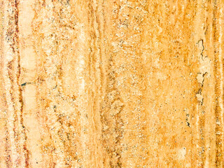 Yellow background with vertical pattern. An old, worn yellow wall with texture.
