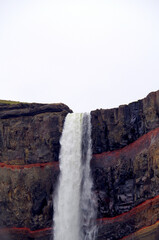 Impressive and breathtaking view onto Iceland´s fourth tallest or highest waterfall cascade...