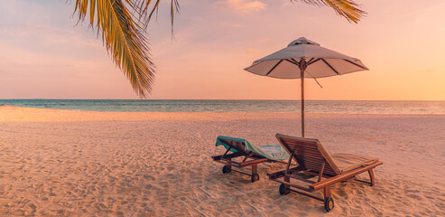 Beautiful beach panorama. Chairs on the sandy beach at seaside. Summer holiday vacation for couple tourism. Amazing tropical landscape. Tranquil scenic, relaxing beach tropical landscape, island shore