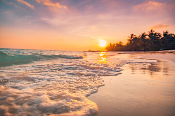 Beautiful closeup wave. Amazing sunset tropical paradise sea beach. Tranquil summer vacation...